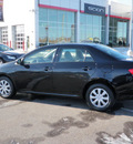 toyota corolla 2009 black sedan le gasoline 4 cylinders front wheel drive automatic 56001