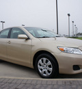 toyota camry 2011 tan sedan le gasoline 4 cylinders front wheel drive automatic 76018