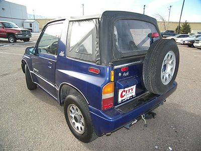 suzuki sidekick 1996 blue suv le gasoline 4 cylinders 4 wheel drive automatic 81212