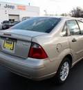 ford focus 2006 gold sedan zx4 se gasoline 4 cylinders front wheel drive automatic with overdrive 07730