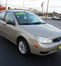 ford focus 2006 gold sedan zx4 se gasoline 4 cylinders front wheel drive automatic with overdrive 07730