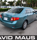 toyota corolla 2009 green sedan le gasoline 4 cylinders front wheel drive automatic 32771