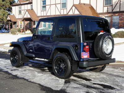 jeep wrangler 2000 black suv sport gasoline 6 cylinders 4 wheel drive 5 speed manual 80012