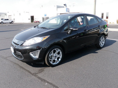 ford fiesta 2011 black sedan sel 4dr gasoline 4 cylinders front wheel drive automatic 56301