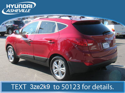 hyundai tucson 2012 dk  red gls awd gasoline 4 cylinders all whee drive automatic 28805