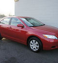 toyota camry 2009 red sedan le gasoline 4 cylinders front wheel drive automatic 98371