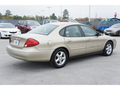 ford taurus 2002 beige sedan ses gasoline 6 cylinders front wheel drive automatic 77388