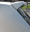 nissan versa 2011 silver hatchback sl gasoline 4 cylinders front wheel drive automatic 33884