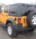 jeep wrangler unlimited 2012 orange suv sport gasoline 6 cylinders 4 wheel drive 5 speed automatic 62863