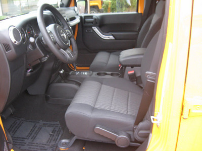 jeep wrangler unlimited 2012 orange suv sahara gasoline 6 cylinders 4 wheel drive automatic 45840