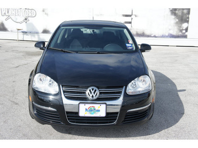 volkswagen jetta 2010 black sedan gasoline 5 cylinders front wheel drive automatic 77388