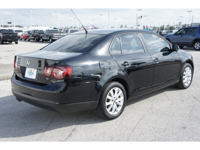 volkswagen jetta 2010 black sedan gasoline 5 cylinders front wheel drive automatic 77388