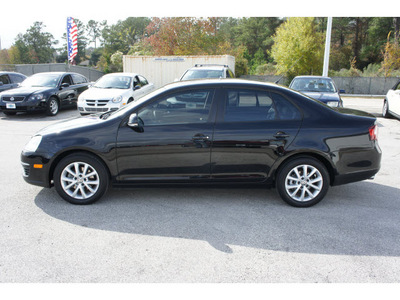 volkswagen jetta 2010 black sedan gasoline 5 cylinders front wheel drive automatic 77388