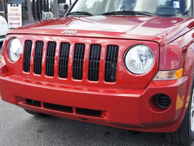 jeep patriot 2009 red suv sport gasoline 4 cylinders 2 wheel drive automatic 33021