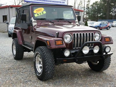 jeep wrangler 2001 burgandy suv sahara gasoline 6 cylinders 4 wheel drive automatic 27569