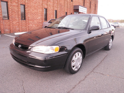 toyota corolla 1998 black sedan le gasoline 4 cylinders front wheel drive 28217