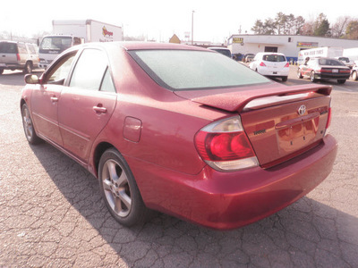 toyota camry 2006 red sedan se v6 gasoline 6 cylinders front wheel drive automatic 28217