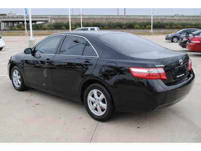 toyota camry 2009 black sedan le gasoline 4 cylinders front wheel drive automatic 77065