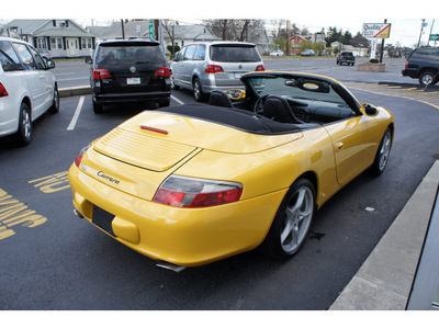 porsche 911 2003 yellow carrera gasoline 6 cylinders 6 speed manual 08016