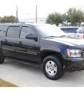 chevrolet suburban 2009 black suv lt gasoline 8 cylinders 2 wheel drive automatic with overdrive 77090