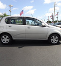chevrolet aveo 2009 silver hatchback aveo5 lt gasoline 4 cylinders front wheel drive automatic 33177