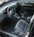 volkswagen jetta 2010 black sedan se pzev gasoline 5 cylinders front wheel drive automatic 91731