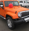 jeep wrangler unlimited 2012 orange suv sahara gasoline 6 cylinders 4 wheel drive 5 speed automatic 62863
