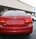 kia optima 2009 red sedan sx gasoline 4 cylinders front wheel drive automatic 27215