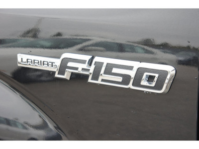 ford f 150 2010 black lariat flex fuel 8 cylinders 4 wheel drive automatic 77388