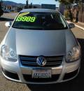 volkswagen jetta 2009 silver sedan s pzev gasoline 5 cylinders front wheel drive automatic 93955