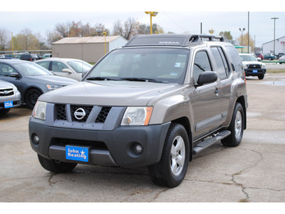 nissan xterra 2006 bronze suv gasoline 6 cylinders rear wheel drive automatic with overdrive 77037