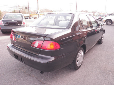 toyota corolla 1998 black sedan le gasoline 4 cylinders front wheel drive 28217