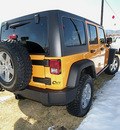 jeep wrangler 2012 orange suv unlimited rubic gasoline 6 cylinders 4 wheel drive automatic 81212