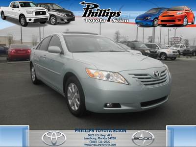 toyota camry 2007 lt blue sedan xle gasoline 4 cylinders front wheel drive automatic 34788