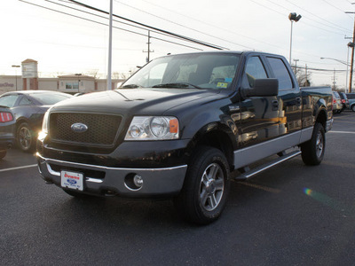 ford f 150 2006 black xlt gasoline 8 cylinders 4 wheel drive automatic with overdrive 08753
