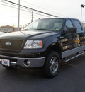 ford f 150 2006 black xlt gasoline 8 cylinders 4 wheel drive automatic with overdrive 08753