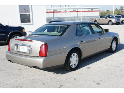 cadillac deville 2001 brown sedan gasoline 8 cylinders dohc front wheel drive automatic 77388