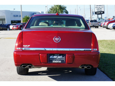cadillac dts 2009 dk  red sedan luxury 5 passenger gasoline 8 cylinders front wheel drive automatic 33870