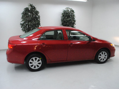 toyota corolla 2009 red sedan le gasoline 4 cylinders front wheel drive automatic 91731