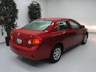 toyota corolla 2009 red sedan le gasoline 4 cylinders front wheel drive automatic 91731