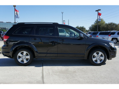 dodge journey 2010 black suv sxt gasoline 6 cylinders front wheel drive automatic with overdrive 77090