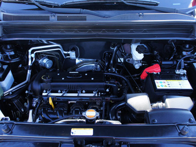 kia soul 2010 black hatchback gasoline 4 cylinders front wheel drive 5 speed manual 76018