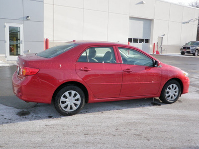 toyota corolla 2009 red sedan le gasoline 4 cylinders front wheel drive automatic 56001