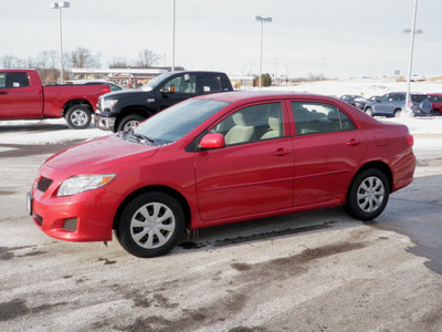 toyota corolla 2009 red sedan le gasoline 4 cylinders front wheel drive automatic 56001