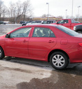 toyota corolla 2009 red sedan le gasoline 4 cylinders front wheel drive automatic 56001