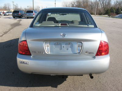 nissan sentra 2004 silver sedan 1 8 s gasoline 4 cylinders front wheel drive automatic with overdrive 45840