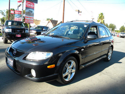 mazda protege5 2003 black hatchback gasoline 4 cylinders dohc front wheel drive 5 speed with overdrive 92882