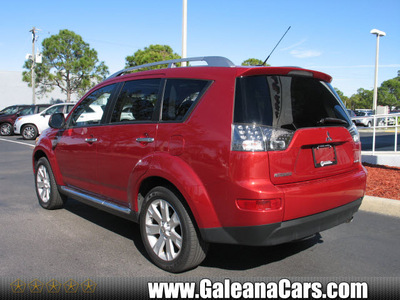 mitsubishi outlander 2009 red suv se gasoline 4 cylinders front wheel drive automatic 33912