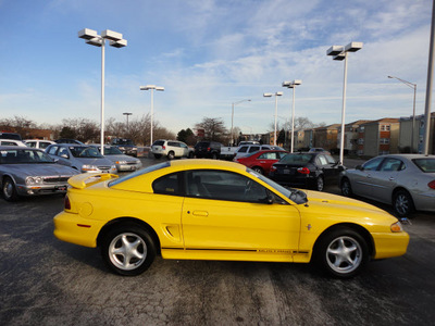 ford mustang 1998 yellow coupe gasoline v6 rear wheel drive automatic with overdrive 60546