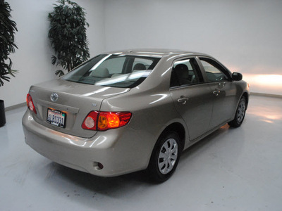 toyota corolla 2010 tan sedan le gasoline 4 cylinders front wheel drive automatic 91731